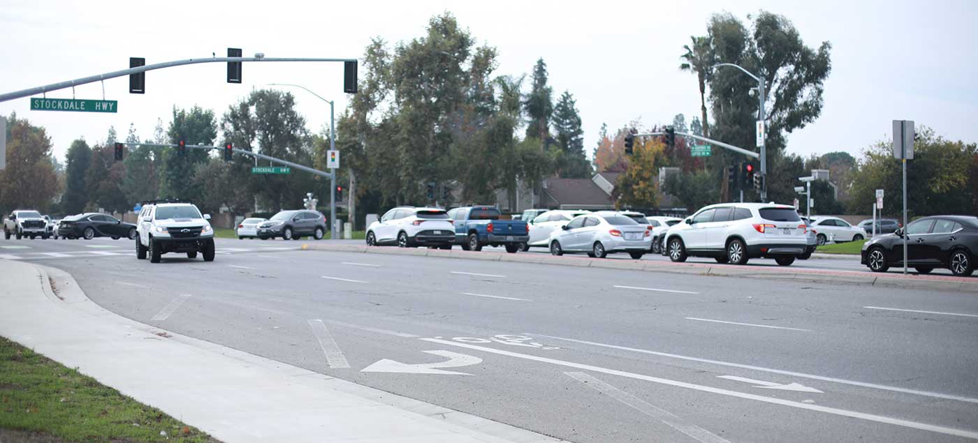 A right-turn lane merging with a bike lane along Coffee Road near the intersection of Stockdale Highway in Bakersfield.